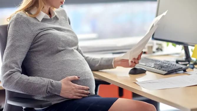 pregnant woman at the office