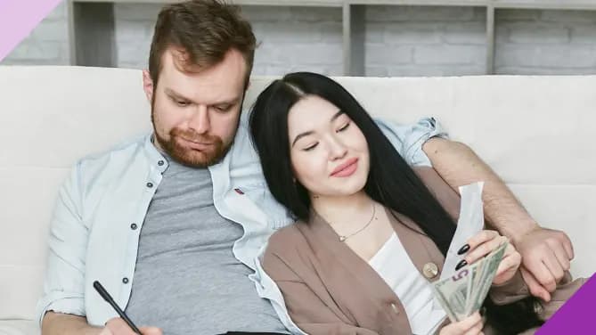 Couple calculating money, illustrating how to combine finances after marriage