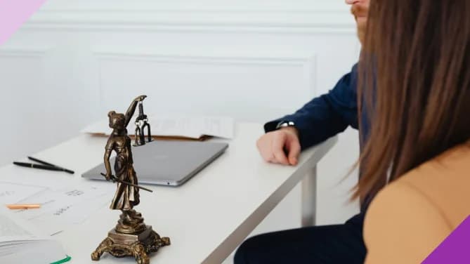 Couple in a lawyer's office discussing a prenup