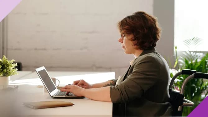 Woman on computer, illustrating how to write a resume objective