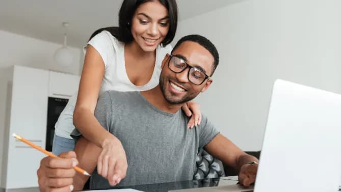 man and woman editing resume