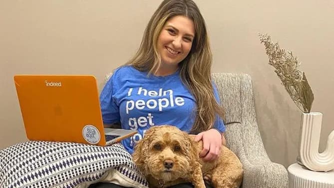 An Indeed employee and dog.