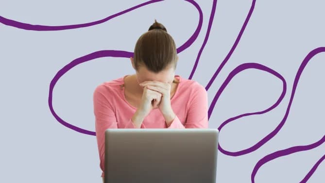 a woman stressed on a laptop