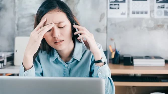 Frustrated woman at work
