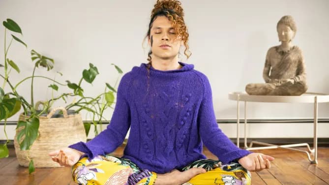 gender fluid person meditating 