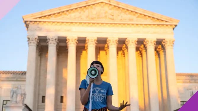 abortion activist standing outside the supreme court