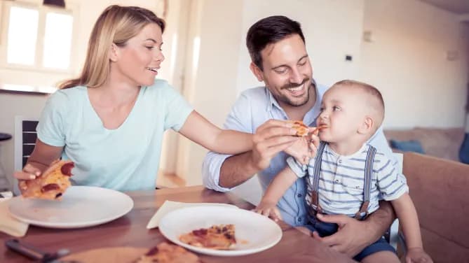 Family with pizza