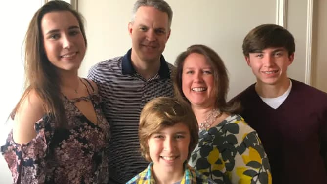 Mary Ann Travers, principal (partner) at Crowe LLP, and her family. Photo Courtesy of Crowe LLP. 