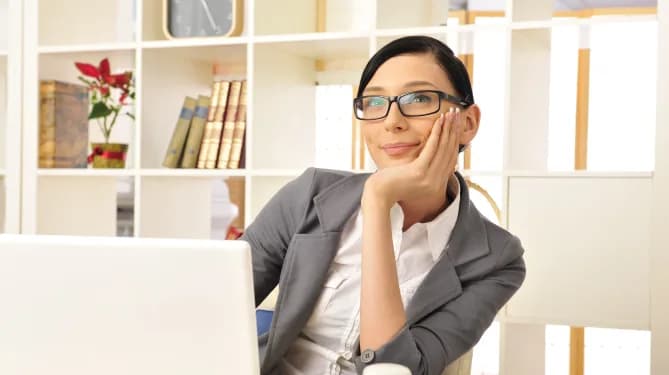 woman avoiding her work staring into space