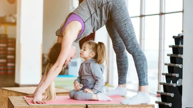 Woman with toddler doing yoga