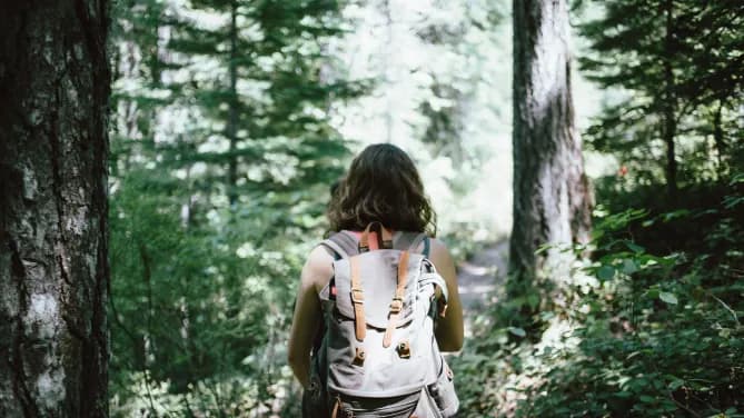 young woman backpacking