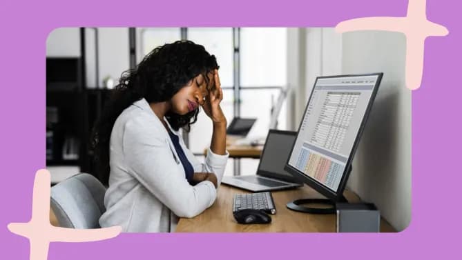 a woman stressed at work in front of her laptop
