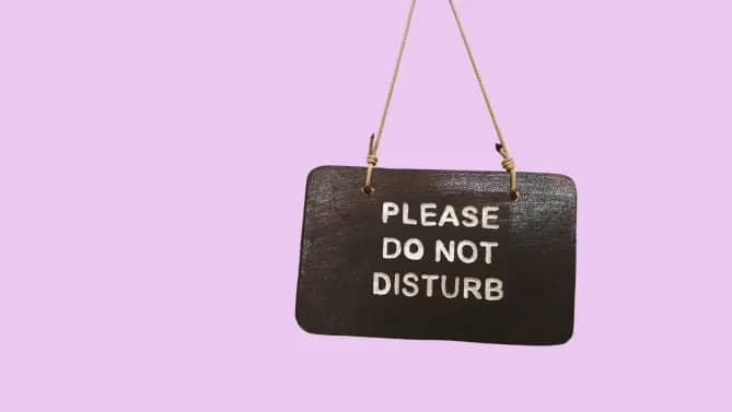 "please do not disturb" sign