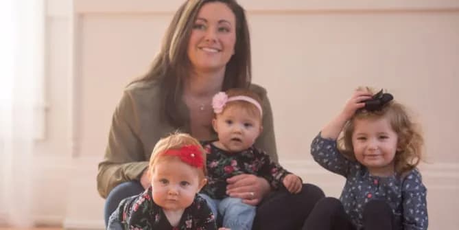 Katie Ockerman, a financial center manager for Fifth Third Bank, and daughters, Naomi, 2; and 10-month old twins, Cora and Madilyn. Photo courtesy of Fifth Third Bank